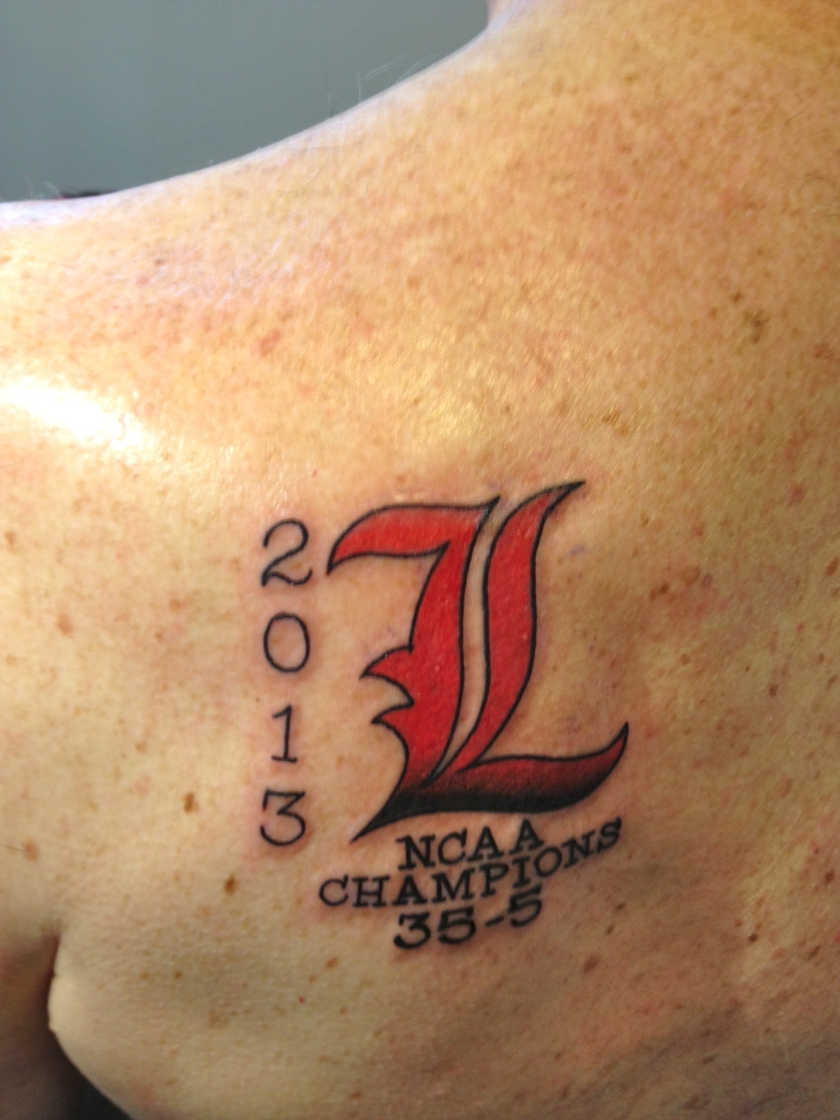 University of Louisville basketball coach Rick Pitino promised his team that, if they won the NCAA Championship, he'd get a tattoo.  Promise kept.